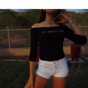 Black Bebe off the shoulder shirt